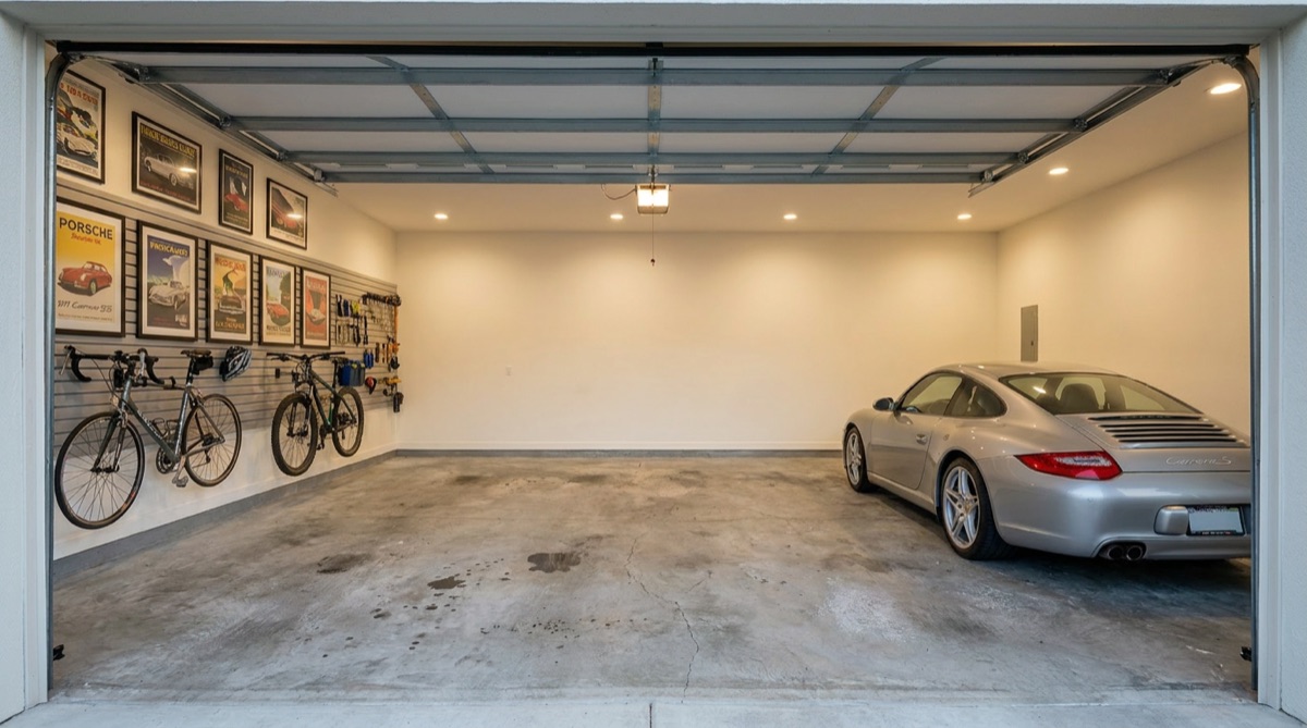 Bare, stained garage concrete before coating