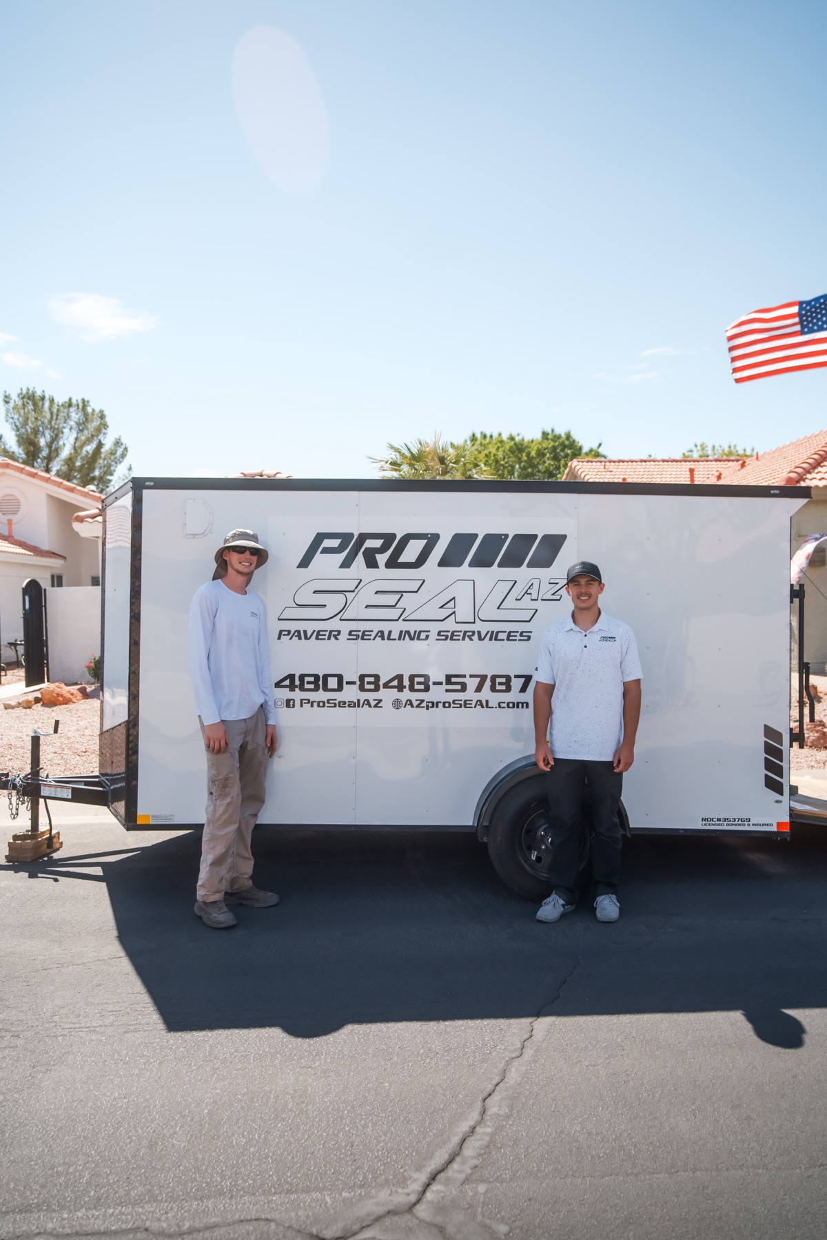 Pro Seal AZ team members in front of the branded trailer